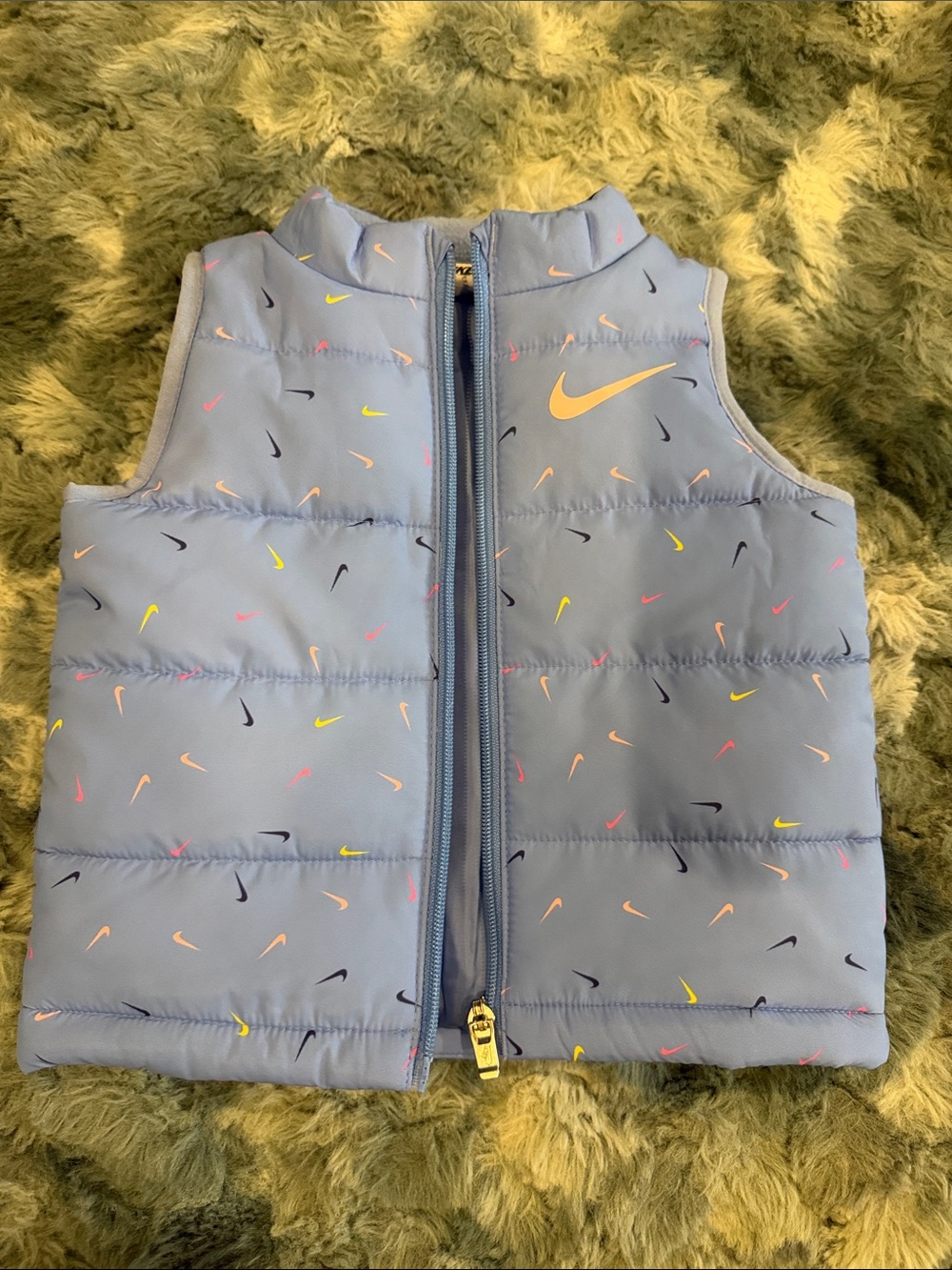 Nike Light Blue Kids Puffer Vest with Multicolor Swoosh Accents